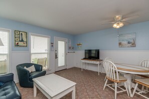 Updated living area with an amazing view of the beach right out front