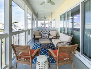 Furnished balcony with a partial  ocean view