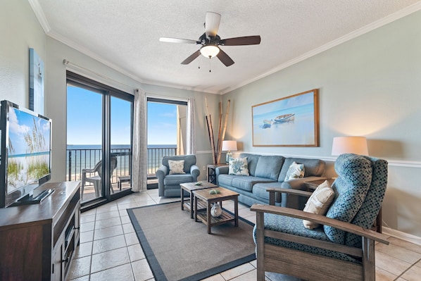 Spacious Living Room with Sleeper Sofa and Balcony Access