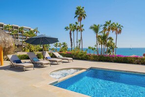 Poolside patio with ocean views
