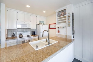 Beautiful granite countertops. And new cabinets.