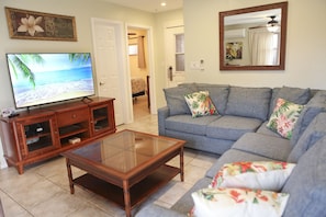 Updated living room with plenty of seating space.