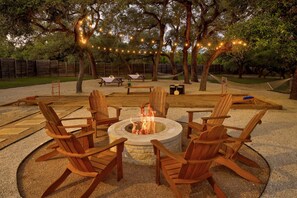 Wood Burning Fire Pit under sparkling party lights