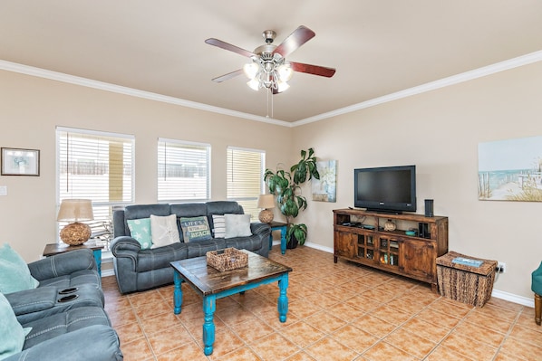Spacious living area with new seating for the whole family to relax
