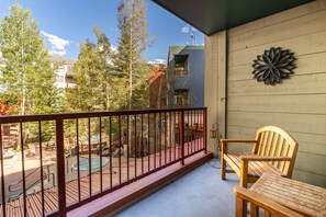 Private balcony with outdoor seating.