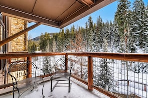 Private balcony with outdoor seating and ski-slope views!