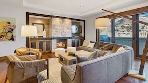 Great room with fireplace, TV and views