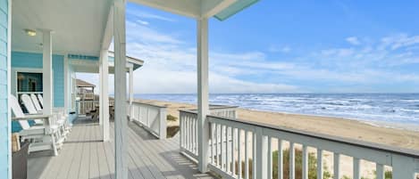 Breathtaking beachfront vista from the comfort of a charming beach house