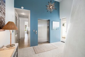 TAKE ELEVATOR TO REACH PENTHOUSE ENTRY