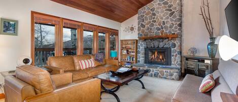 Cozy Living Room with Vaulted Ceilings