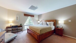 Primary bedroom w/ king-sized bed, ensuite and cable TV