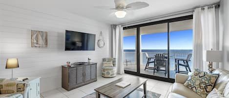 Living Room has access to Private Balcony overlooking the Gulf and has a new Queen Size Sleeper Sofa w/ state -of-the-art Memory Foam Mattress and a Comfortable Recliner