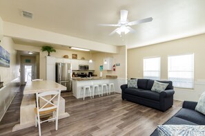 Spacious living, dining, and kitchen area to spend time with loved ones