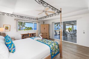 California King bed with ocean views and direct lanai/pool access.