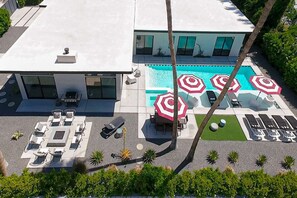 Where Mid-Century Meets 2023, This Architectural Gem Offers 10,000 Square Feet of Indoor / Outdoor Living
