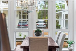 Dining area with chandelier lighting