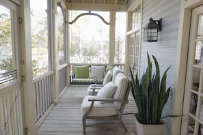 FRONT PORCH W/CLUB CHAIRS & SWING