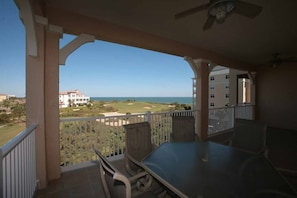 Dine outside and soak in the golf and ocean views.