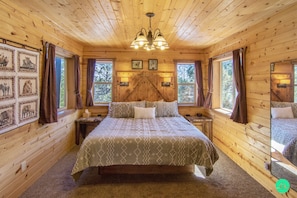 Bedroom on main floor with a king bed
