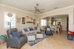 Open-concept common areas create an inviting space for the whole family to father.
