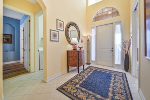 GR12597 - Covered entry outside and welcoming foyer invite you to this lovely home