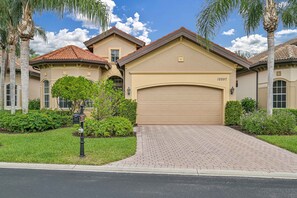 GR12597 - Mediterranean style home with private heated pool and spa in the upscale community of Grandezza in Estero, Florida