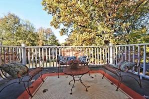 Outside metal seating area with pillows
