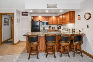Great Kitchen - Kitchen is open to the great room - nice for socializing.