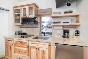 The kitchenette has a cooktop, microwave & mini fridge!  Great for all your basic cooking needs.
