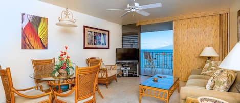 Tropical Living room is open to the sea breezes and amazing views.