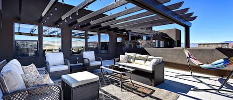 Front Patio Furniture - Enjoy the weather under the pergola while sitting in our comfortable patio furniture.