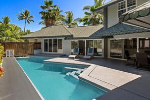 The home is designed for comfortable, relaxed Hawaiian living and features lanais and a swimming pool.