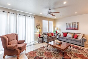 Living Room View - The Living Room is conveniently located adjacent to the Kitchen and Dining Table and is a great place for entertaining guests during downtime.