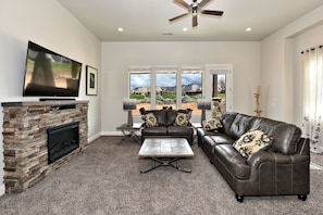 Living Room View - The living room has a beautiful view of The Ledges Golf Course.