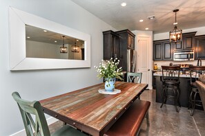 Dining Room - With an open and spacious floor plan, the Dining Room and Kitchen can accommodate meal preparations for groups large or small.