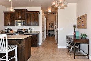 Main Hallway - Main Hallway leading to Master bedroom, front entry way, and staircase.