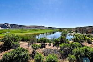 View of Pond and 9th Hole - This is why we named our home Sunrise on the 9th! The views are breathtaking, and it is worth waking up early to lounge on the back patio and enjoy the brilliant sunrise over the 9th hole of the Ledges Golf Course! A pond lends to its enchantment!