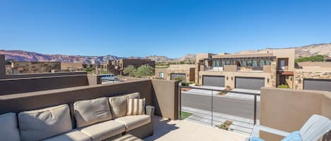 Front Patio View - The Patio Deck is a spacious area to entertain guests while enjoying the beautiful surrounding landscapes of Snow Canyon State Park.