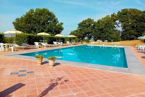 Water, Sky, Plant, Building, Swimming Pool, Azure, Tree, Outdoor Furniture, Cloud, Chair