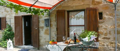 Plant, Building, Window, Property, Table, Shade, Leaf, Door, Chair, Wood