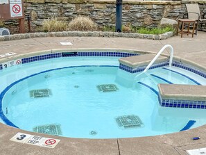 Unwind and rejuvenate in one of two hot tubs, nestled in the tranquil setting of the pool area just out back.