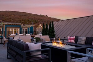 Gas firepit on the rooftop lounge