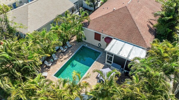 Aerial photo pool, patio and screened lanai.