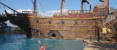 Enjoy you vacation by Pirate ship pool