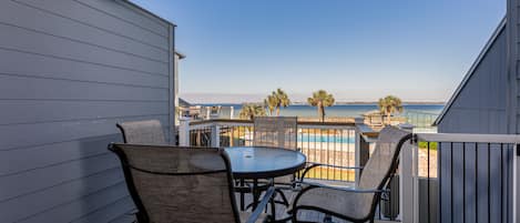 Back deck overlooking pool and Pensacola Bay