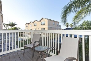 The view from the quiet balcony off the main living area includes the Marlin Cottages Pools.