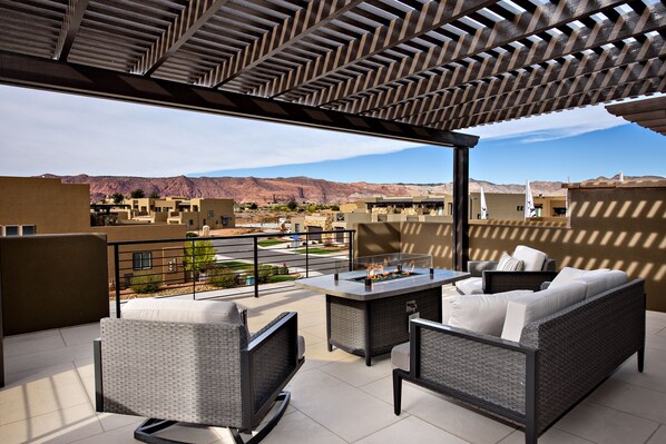 Front Patio Views of Snow Canyon - Stay warm next to the fire pit and relax while watching the sunset over the red mountains.