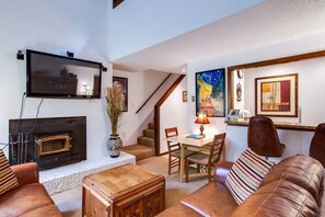 Living room with cozy wood fireplace