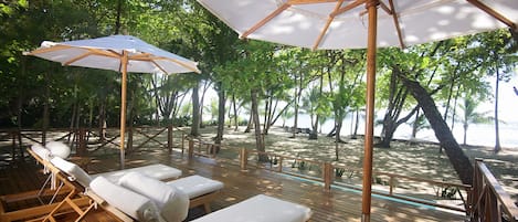 Hammocks under the shade on the beach