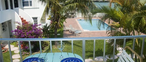 Enjoy breakfast on the balcony overlooking the  pool and lovely 
inland waterway
